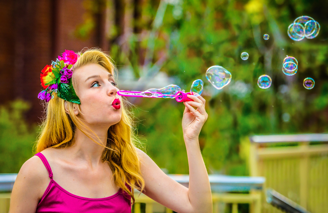 Blonde Babe Blowing Bubbles